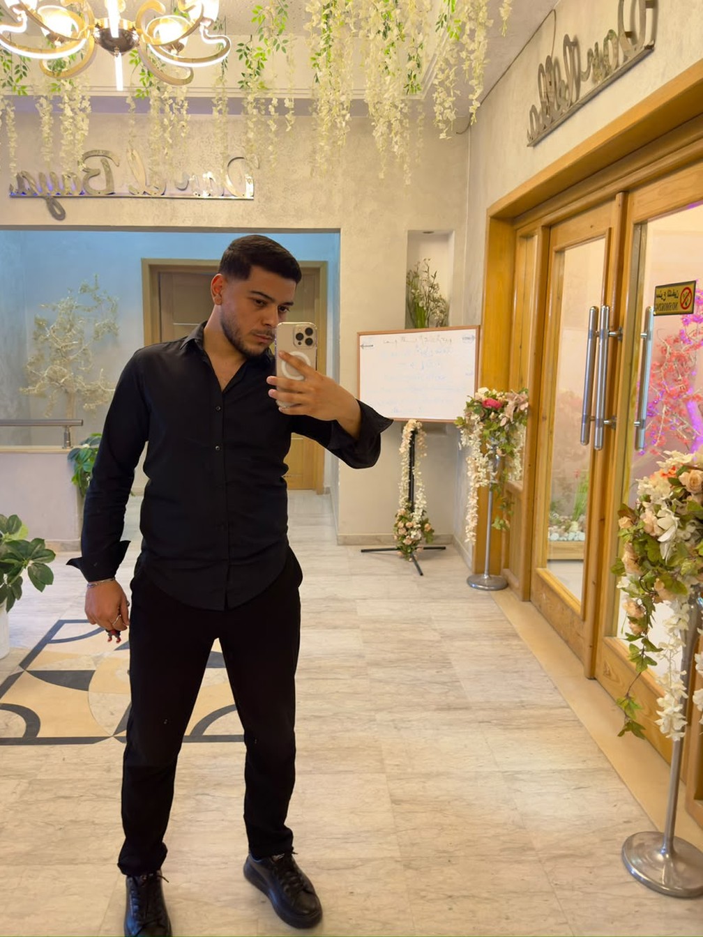 Hamdi Larbi on site at a branding project in Tunis